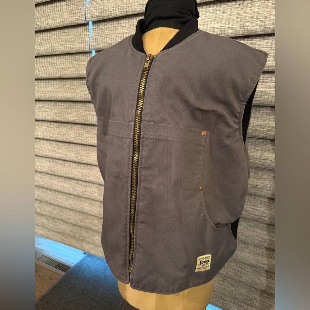 Men’s Jeep brand vest. Gray exterior, black interior. Never worn. XL.Smoke Free